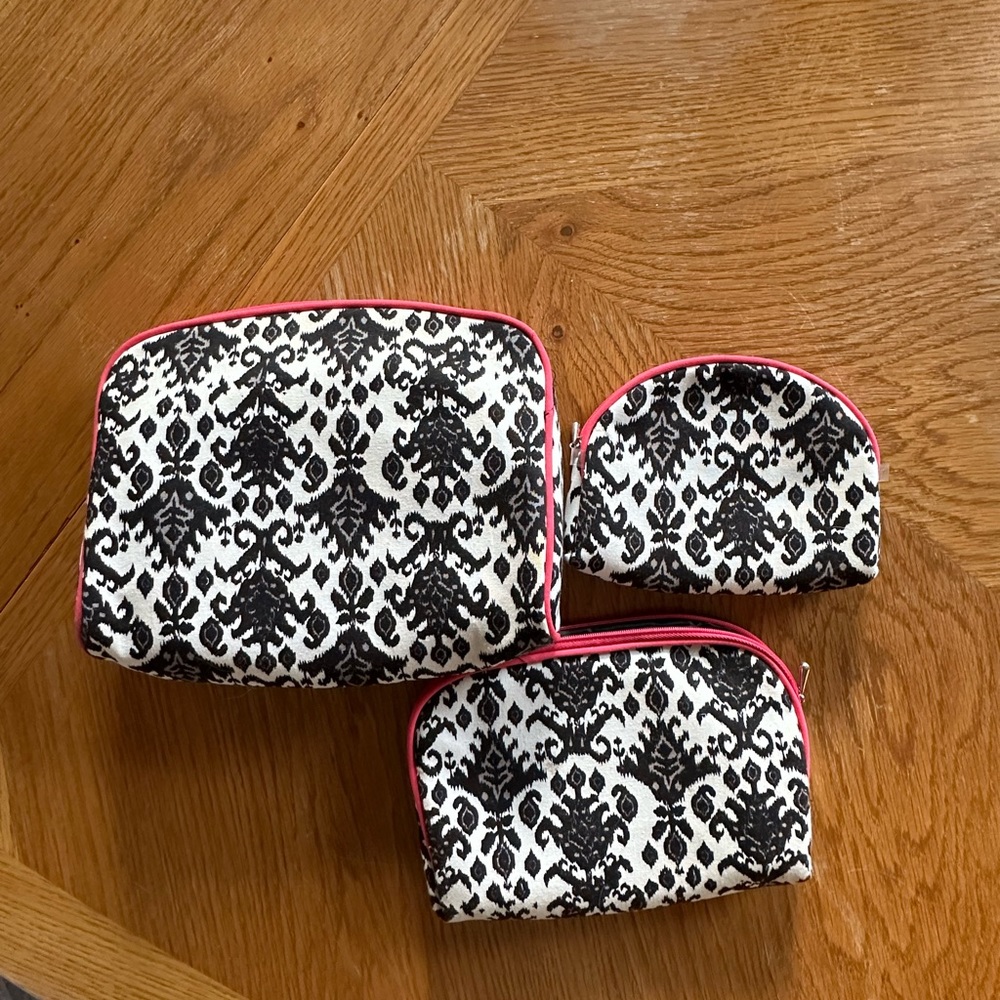 Cosmetic case 3 piece set with zippers. Used but in very good condition.
